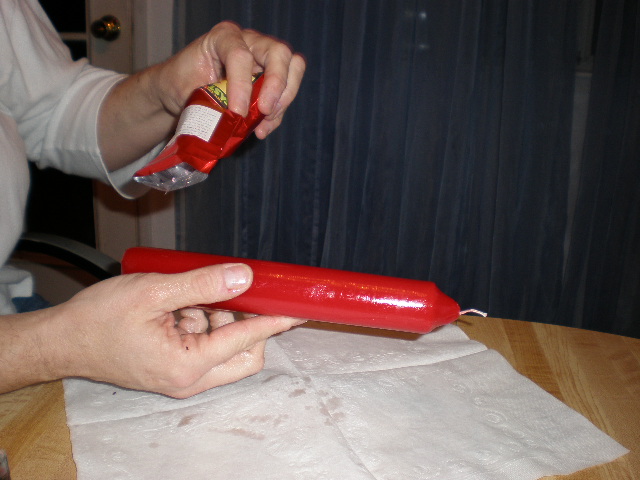 Applying Herbs and Sachet Powders to Free Standing Candles